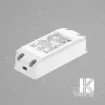 Biały zasilacz LED na szarym tle